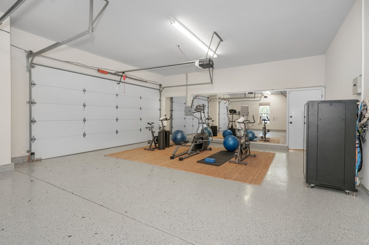 Garage home gym with exercise mats and gym equipment