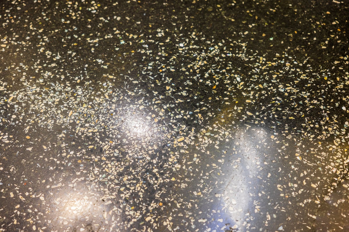Polished terrazzo floor surface with colorful stone fragments